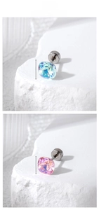 Macro detail of 6mm square crystal earrings in blue and pink with screw back