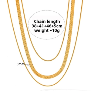 Detail of layered gold snake chains showing 3mm width and 38cm to 46cm adjustable lengths