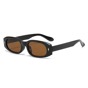 Vintage narrow rectangular sunglasses with glossy black frame and gold metal rivet accents