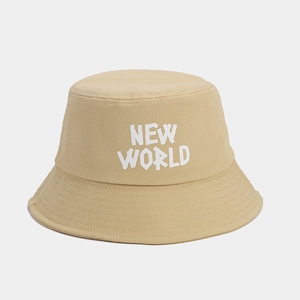 Detailed view of beige canvas bucket hat with NEW WORLD print and reinforced stitching
