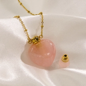 Rose quartz heart perfume bottle necklace in 14K gold plated stainless steel
