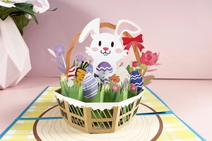 Detail of 3D Easter pop-up card featuring a white bunny in a basket with colorful eggs
