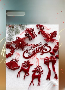 Deep red flocked Christmas ornaments with silver glitter edges on white knit background