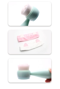 Detailed view of pink and white cat ear headbands with a green facial cleansing brush