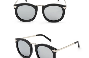 Detail view of polarized UV400 black cat eye sunglasses with silver mirrored lenses