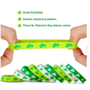 Detail showing high flexibility and elastic stretch of St. Patrick's Day shamrock wristbands