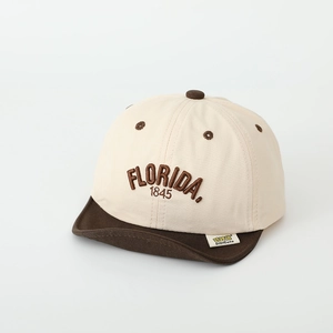 Close-up of FLORIDA 1845 embroidery and soft fabric texture on kids baseball cap