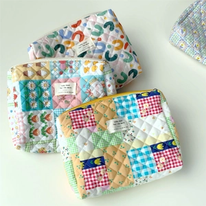 Quilted floral makeup bag set with cute bear and grid patterns for daily organization
