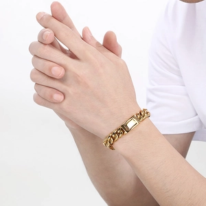 Close-up of a 12mm golden Miami Cuban link bracelet with a sleek rectangular clasp