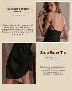 Detail of black satin slip dress showing side tie bows and adjustable silk shoulder straps