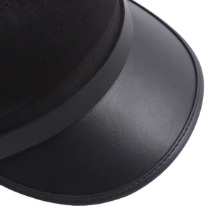 Black flat top cadet hat featuring a textured leather brim with premium stitching detail