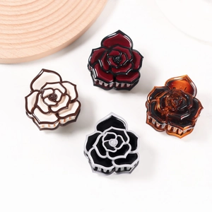 Set of four elegant rose flower hair claws in red, white, black and amber colors