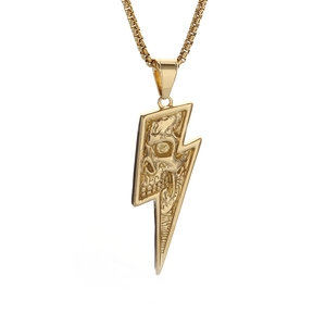 Punk style lightning bolt pendant with skull relief on gold-tone box chain necklace
