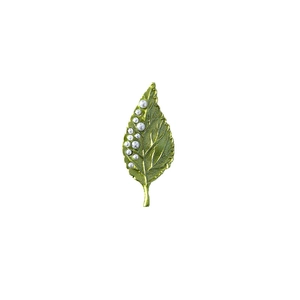 Macro view of green leaf brooch with realistic veins and delicate white pearl accents