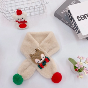 Detail of beige plush reindeer scarf with festive red and green pom-poms and tiny bell