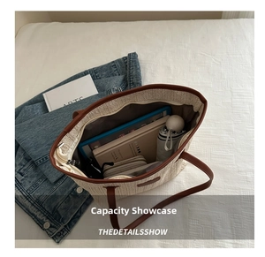 Internal view of large woven tote bag showing space for tablet and daily items
