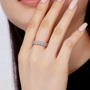 Detailed view of S925 sterling silver ring featuring baguette-cut sparkling crystals on finger