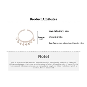 Bracelet à clochettes argenté avec texture tissée montrant le poids de 27,8g et le diamètre