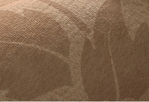Macro shot of brown retro leaf pattern jacquard texture on water-resistant rug fabric