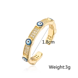 Detailed view of evil eye open ring showing 1.8cm inner diameter and 3g weight