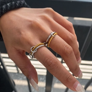 Minimalist stainless steel mixed metal multi-layered ring set with gold beaded textures