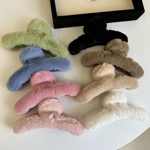 Set of colorful plush hair claws in soft faux fur for elegant autumn and winter styling