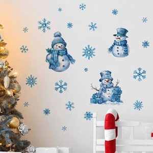 Détail de stickers muraux bonhomme de neige de Noël avec flocons de neige bleus sur mur
