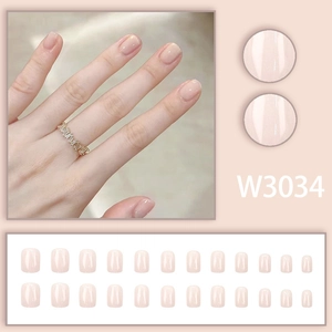 Detail view of W3034 jelly pink press-on nails set with 24 gradient glossy nail tips