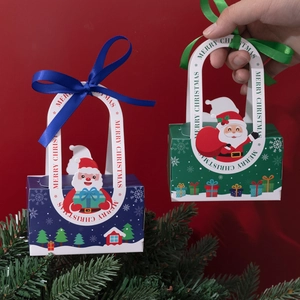 Christmas gift boxes in blue and green with ribbons and Santa Claus patterns