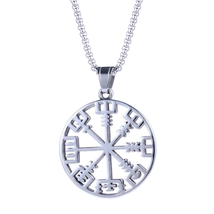 Detail of silver Viking Vegvisir compass pendant in polished stainless steel