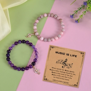 Bracelets musicaux en pierre zèbre rose avec pendentif note dorée et carte cadeau