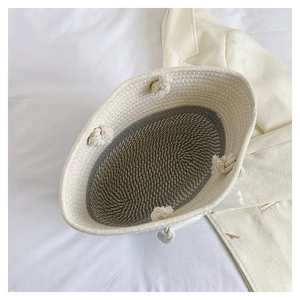 Top view of hand-woven cotton rope tote bag showing interior texture and knot detail