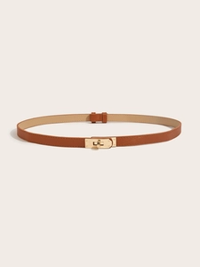 Detail of slim brown leather belt featuring a gold-tone twist-lock buckle and cross texture