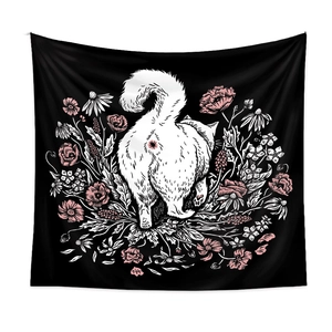 Detailed close-up of a black tapestry with artistic white cat and pink floral patterns