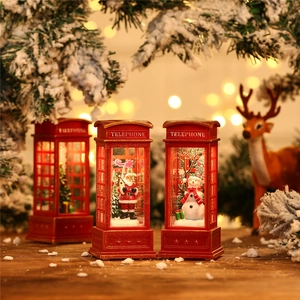 Red Christmas telephone booth lantern with Santa Claus and snowman inside for festive decor