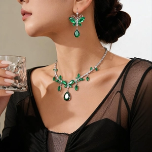 Vintage palace style jewelry set with green butterfly teardrop necklace and earrings
