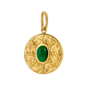 Macro detail of vintage round gold pendant featuring an oval green gemstone inlay
