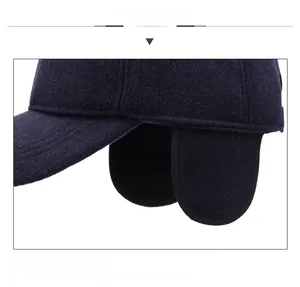 Close-up of winter knit baseball cap with integrated ear flaps for cold protection