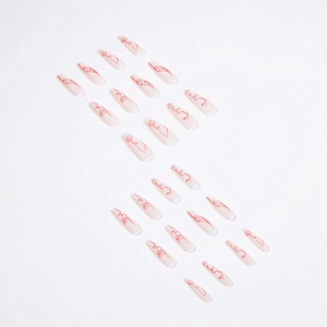 Artistic abstract face line art on long coffin press-on nails with semi-sheer white base