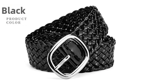 Detail of black woven PU leather belt featuring a glossy finish and silver oval buckle
