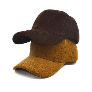 Textured corduroy baseball caps in brown and yellow for women winter fashion styling