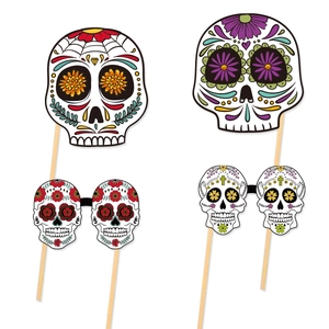 Set of four colorful Day of the Dead sugar skull photo props on sticks for Halloween