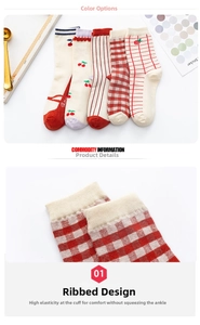 Close-up of elastic ribbed cuffs on cherry pattern combed cotton crew socks