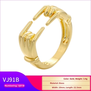 Detailed view of 3.4g brass hugging rock hand ring in gold finish with 20x22.5mm size