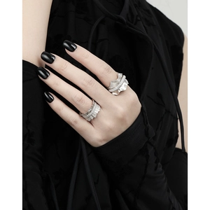 Irregular textured S925 sterling silver ring with sparkling micro-pave diamond details