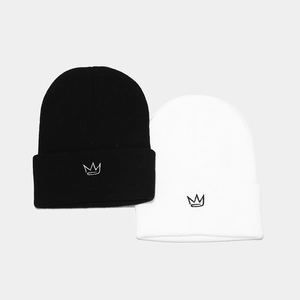 Classic black and white knit beanies with embroidered crown logo in a two-piece set