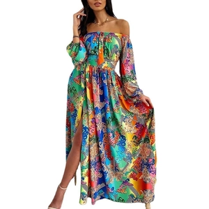 Detail of colorful baroque floral print on off-shoulder long dress with high side slit