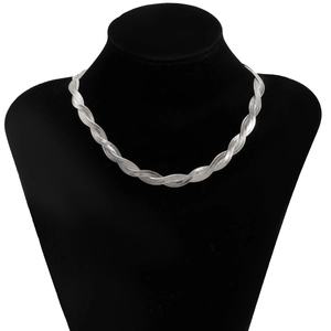 Close-up of silver braided herringbone choker necklace on a black velvet mannequin bust