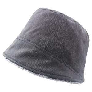 Detail of dark gray denim bucket hat with warm white fleece lining and raw edges