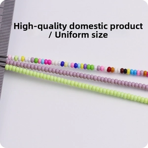 Macro detail of 3mm colorful wear-resistant glass seed beads with ruler measurement
